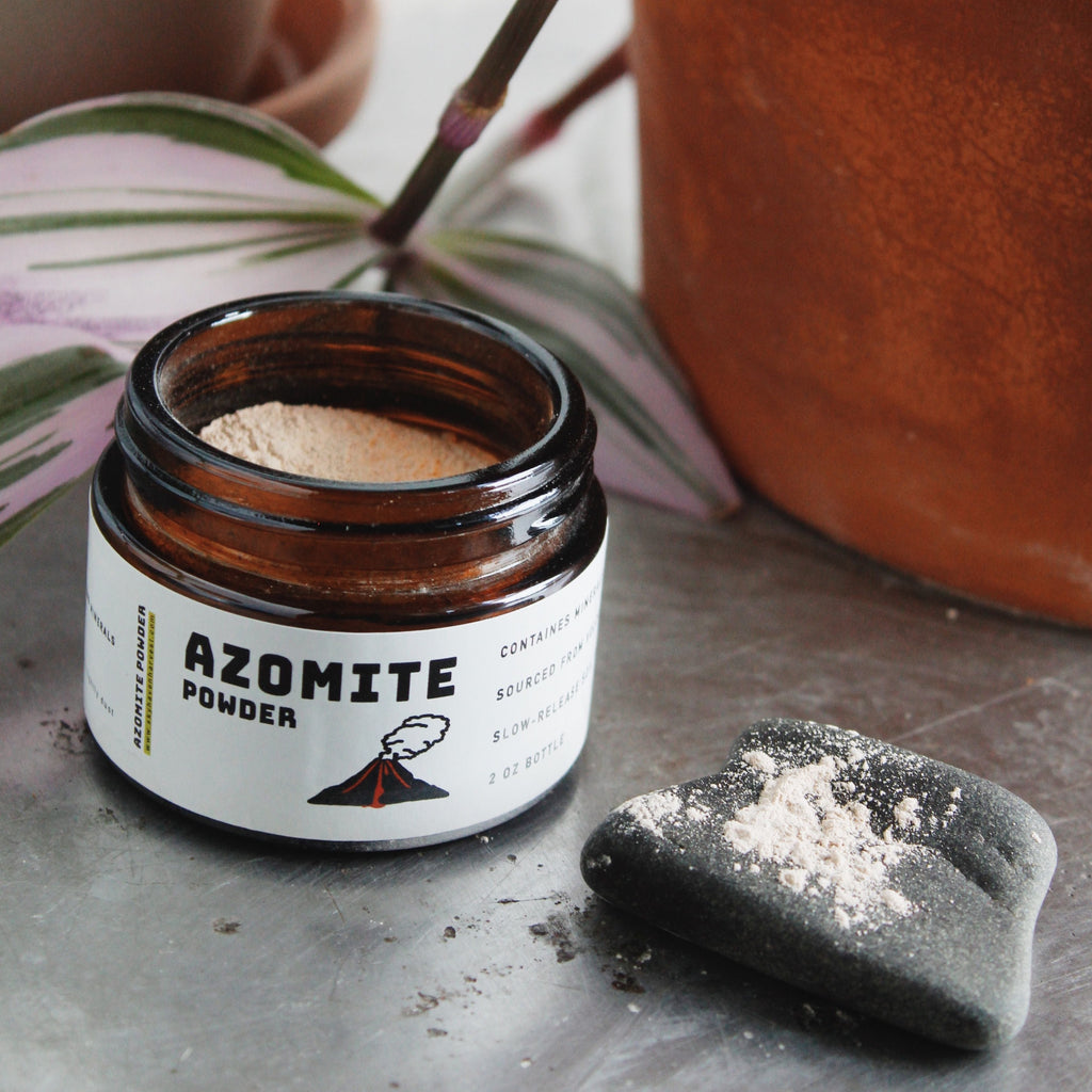 Azomite powder jar open showing granules 